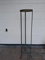 Zware smeedijzer plantenstaander, Ophalen