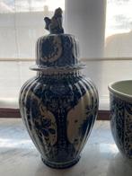 Delfts blauwe vaas, Ophalen