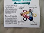 Merk Tomy.  Ring met verschillende activiteiten., Ophalen of Verzenden, Zo goed als nieuw