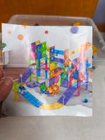 Magnetische knikkerbaan/ rijbaan, Ophalen