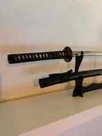 Katana japonais noir, Enlèvement