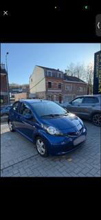 Toyota Aygo 1.0 Essence, Auto's, Toyota, 4 zetels, Stof, 50 kW, Zwart