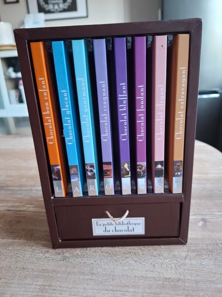 La petite bibliothèque chocolat, Ophalen
