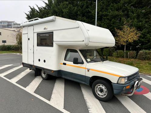Unieke oldtimer camper Toyota Hilux 2.4D, Caravans en Kamperen, Mobilhomes, Particulier, Half-integraal, tot en met 4, Overige merken