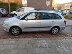 Skoda Fabia 1.2 Benzine 2011, Auto's, Voorwielaandrijving, Euro 5, Stof, Zwart