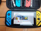Nintendo Switch met spelletjes,  extra Joy con, garantie ., Ophalen of Verzenden, Zo goed als nieuw