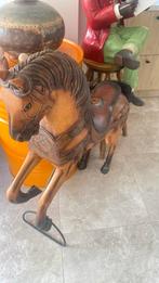 Oud houten paard, Ophalen