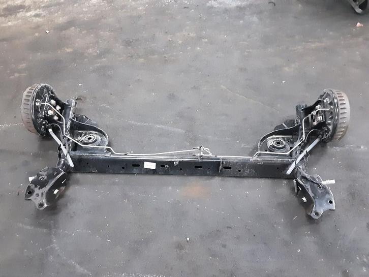 ACHTERAS Logan MCV II / Sandero Wagon (7S) (555011165R), Auto-onderdelen, Remmen en Aandrijving, Dacia, Gebruikt