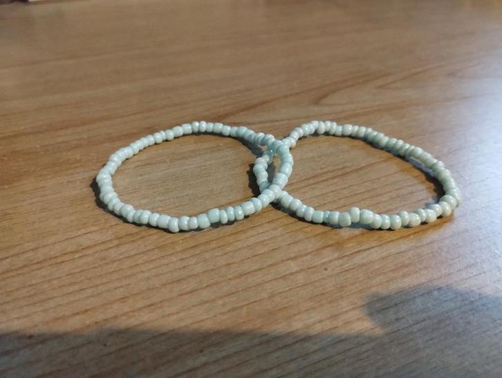 Kralen armbanden, Handtassen en Accessoires, Armbanden, Zo goed als nieuw, Kunststof of Plastic, Blauw, Met bedels of kralen, Ophalen of Verzenden