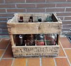 Oude houten bierbak Sampermans 1948 met flessen, Ophalen
