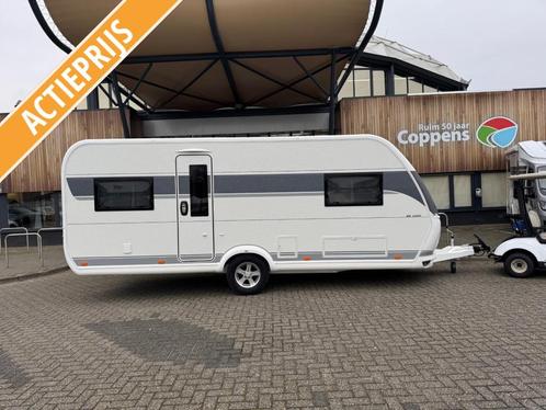 Hobby De Luxe 515 UHL HEFBED + ACTIE PRIJS!, Caravans en Kamperen, Caravans, tot en met 4, 1250 - 1500 kg, Rondzit, Hobby, 2 aparte bedden