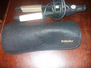 Fer à lisser entièrement nouveau « BABYLISS » disponible aux enchères