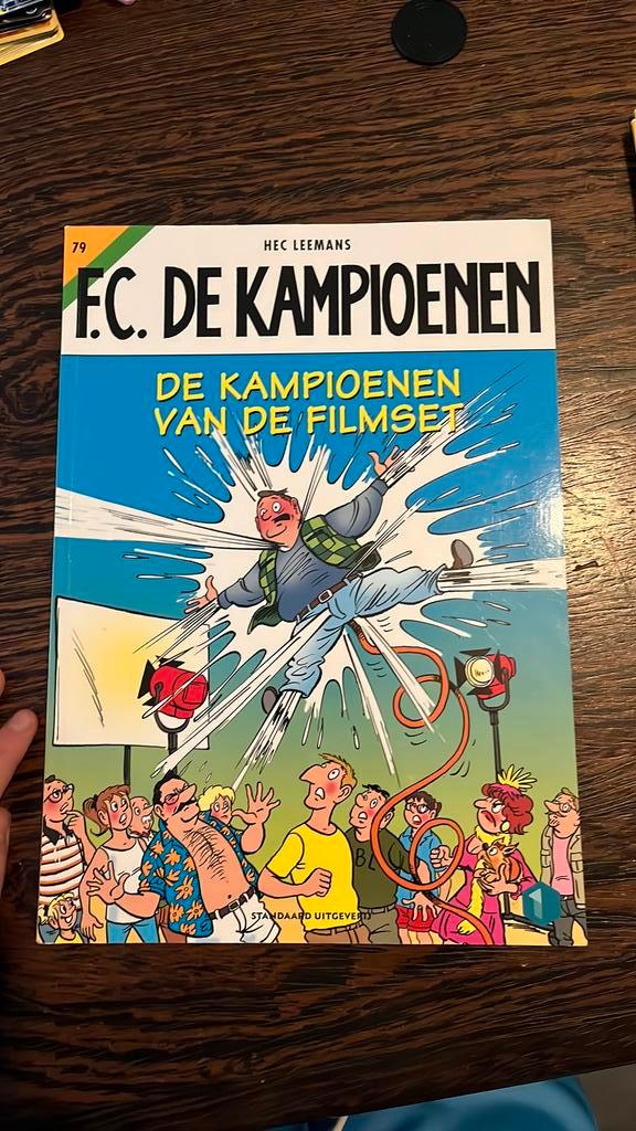 Hec Leemans - De kampioenen van de filmset, Boeken, Stripverhalen, Zo goed als nieuw, Eén stripboek, Ophalen of Verzenden
