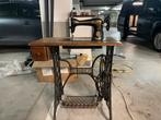 Machine a coudre Singer, Ophalen