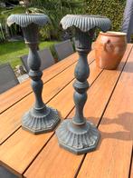 Gietijzeren kandelaars, Ophalen