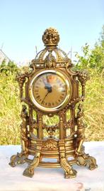 horloge en regule doré mouvement  pile, Ophalen of Verzenden, Gebruikt, Wekker of Tafelklok