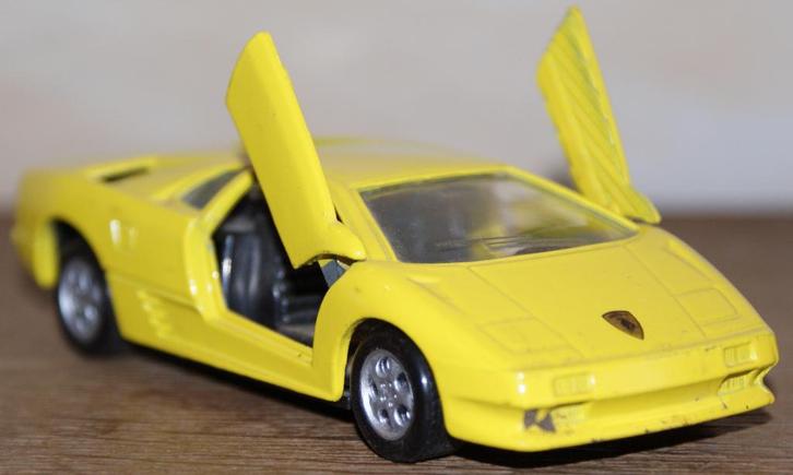 MAISTO (Collection SHELL) - Lamborghini Diablo jaune - 1:40, Hobby en Vrije tijd, Modelauto's | Overige schalen, Zo goed als nieuw