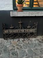 Smeedijzeren uithangbord, Ophalen