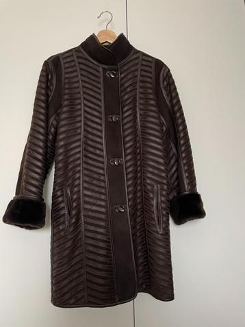 Lederen jas met pelsen voering beschikbaar voor biedingen