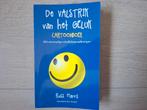 Russ Harris - De valstrik van het geluk cartoonboek, Boeken, Ophalen of Verzenden, Zo goed als nieuw, Russ Harris