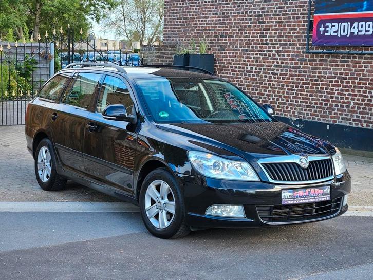 Skoda Octavia 2012 1.6 TDI 105pk/Navi/Trekhaak, Auto's, Skoda, Bedrijf, Te koop, Octavia, ABS, Airbags, Airconditioning, Bluetooth