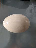 Oeuf en marbre poli, Ophalen