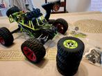 Buggy 1:12 met verbeterde aluminium onderdelen + 4 rode wiel, Ophalen of Verzenden, Gebruikt