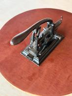 Antieke nietjesmachine, Ophalen