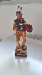 Oud beeldje accordeonspeler, Enlèvement ou Envoi