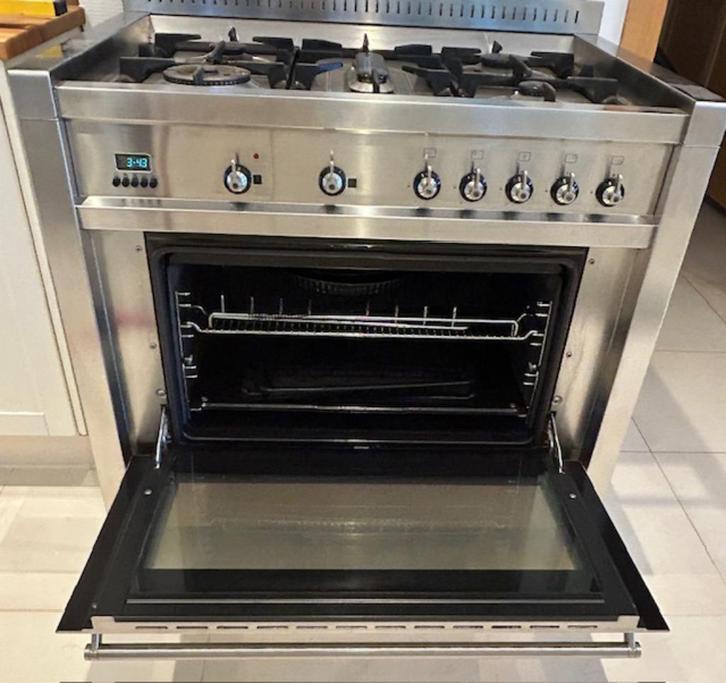 Smeg fornuis met bijbehorende dampkap en inox spatplaat, Huis en Inrichting, Keuken | Keukenelementen, Gebruikt, Minder dan 100 cm