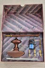 set de calligraphie, Enlèvement