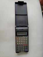 Rekenmachine van het merk Casio uit het jaar '80 werkt, Diversen, Rekenmachines, Ophalen, Zo goed als nieuw