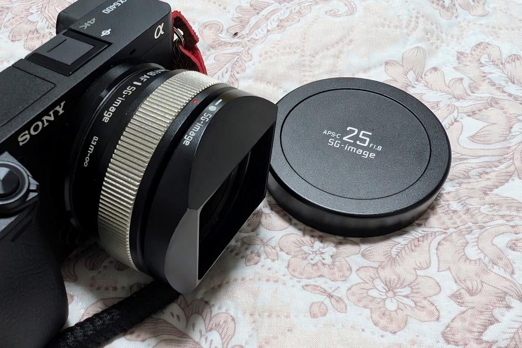 SG image 25mm F/1.8, TV, Hi-fi & Vidéo, Photo | Lentilles & Objectifs, Enlèvement ou Envoi