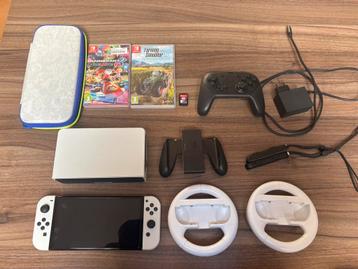 Nintendo switch oled met toebehoren beschikbaar voor biedingen