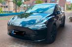 Tesla Model Y Solid Black, Auto's, Tesla, Automaat, Stuurwielverwarming, Achterwielaandrijving, Zwart