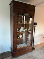 Antieke vitrinekast, Ophalen