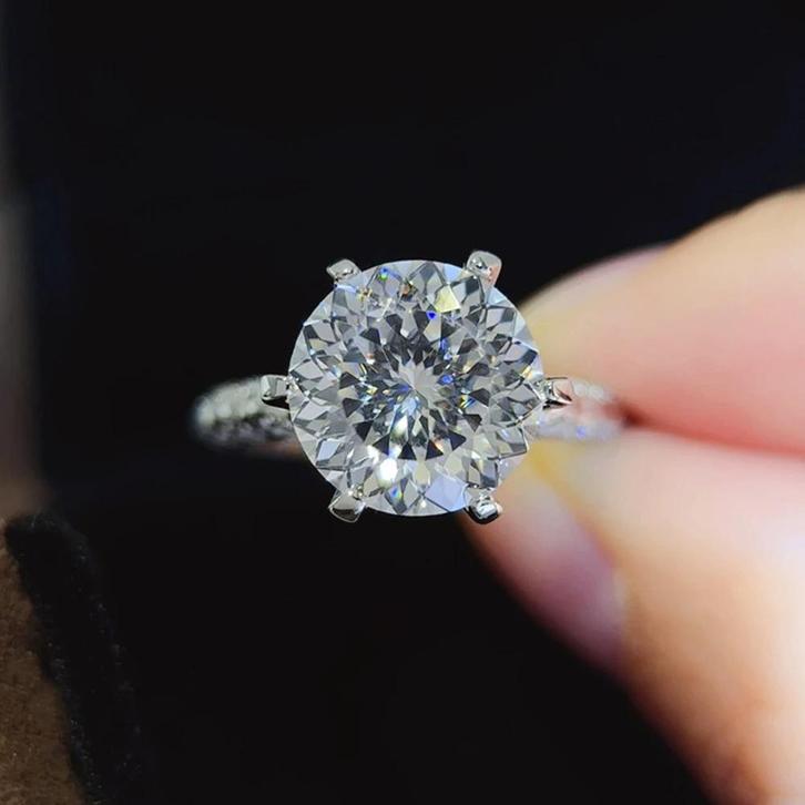 Nieuwe ring 5 karaat + 1 gratis!, Bijoux, Sacs & Beauté, Bagues, Neuf, Femme, 17 à 18, Blanc, Avec pierre précieuse, Envoi