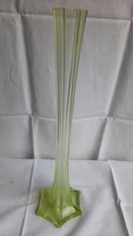 Groene glazen vaas, Ophalen