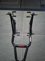 Paddock stand voorwiel Constands, Ophalen