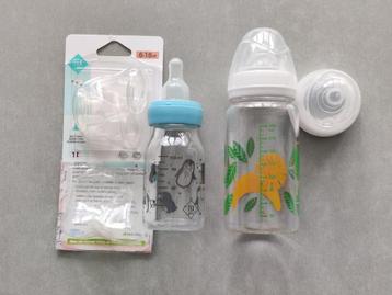 Set van 2 glazen baby drinkflessen met reserve spenen. beschikbaar voor biedingen