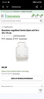 Twee dwergpapegaaien met kooi