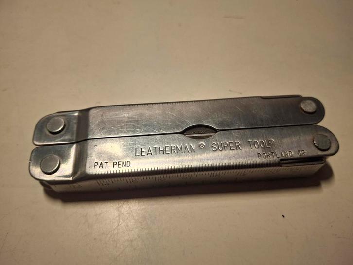 Leatherman super tool Pat pend, Caravans en Kamperen, Kampeergereedschap, Zo goed als nieuw, Ophalen of Verzenden