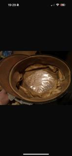 Zwarte pet ww2, Ophalen