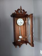 Antieke hangklok, Ophalen