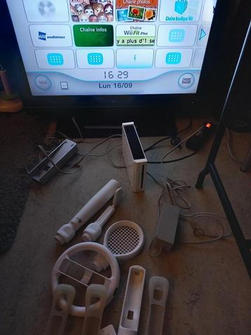 Console wii , 2 manettes et différents accessoires, Enlèvement, Utilisé, Avec 2 manettes, Avec volant