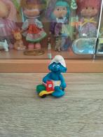 schtroumpfs smurf 20447 bébé avec son camion, Collections, Schtroumpfs, Envoi, Comme neuf, Bébé Schtroumpf, Poupée, Figurine ou Peluche