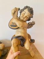 Antieke wandengelen., Ophalen