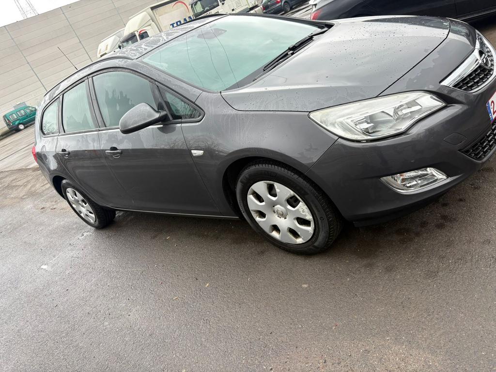 Opel Astra 2011 benzine euro 5, Auto's, Voorwielaandrijving, Stof, Bedrijf, Handgeschakeld