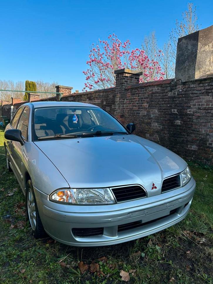 Mitsubishi Carisma 4G9, Auto's, Mitsubishi, Particulier, Carisma, Benzine, 5 deurs, Handgeschakeld, Zilver of Grijs, Zwart, Stof