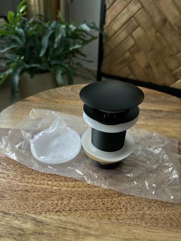 Afvoer met druksluiting /Wastafelafvoerplug  beschikbaar voor biedingen